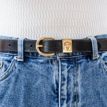black leather belt | 80s 90s Etienne Aigner skinny black vintage belt shiny gold buckle 