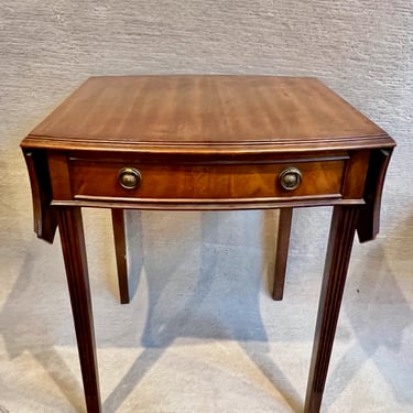 Item #AC115  Dazzling mahogany table drop leaf and drawer c.1940’s