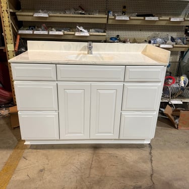 Single Bathroom Vanity with White Base and Stone Countertop