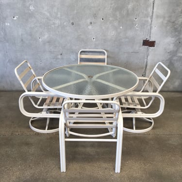 Tropitone Table with Four Chairs