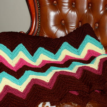 vintage afghan crocheted chevron pattern in brown, green, yellow and rose 