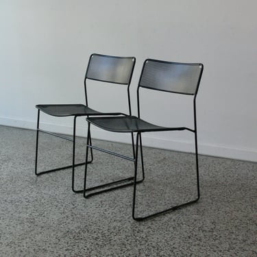 Modernist Perforated Metal Stacking Dining Chairs In the Manner of Niels Jorgen Haugesen (Set of 2) 