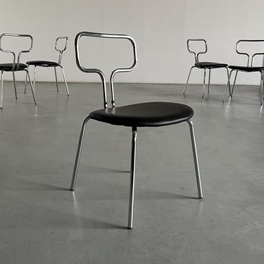 Bauhaus Design Curved Chrome Tubular Steel and Faux Leather Dining Chairs 