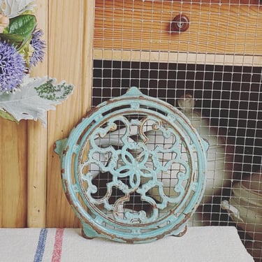 Beautiful vintage French cast iron trivet in blue, turquoise 