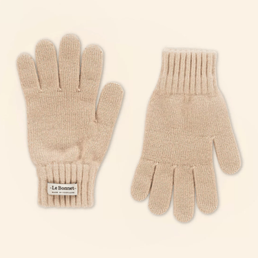 Wool gloves, sand