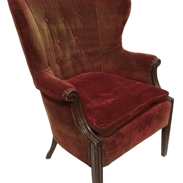 Vintage Wingchair Upholstered in light brown fabric with grommeted details 