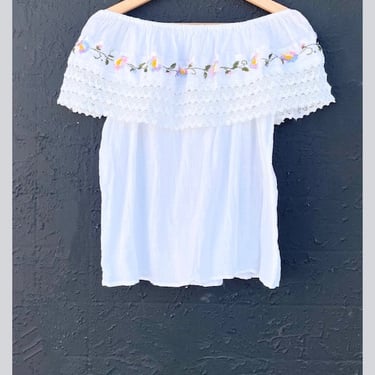 White embroidered off shoulder blouse