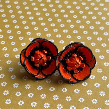 orange flower enamel earrings 1950s clip ons 