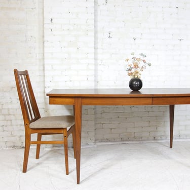 Vintage MCM walnut wood 66" "Surfboard" shape dining / kitchen table by Broyhill furniture | Free delivery only in NYC and Hudson Valley 