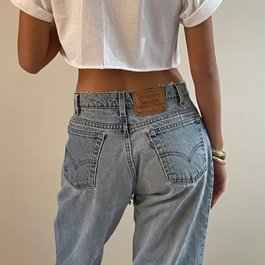 29 Levis 560 vintage jeans / vintage light wash faded soft torn red tab relaxed boyfriend baggy slouchy zipper fly Levis 560 jeans | size 29 
