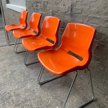 Set of Four Orange Shell Chairs