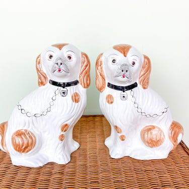Pair of Orange Dog Figurines