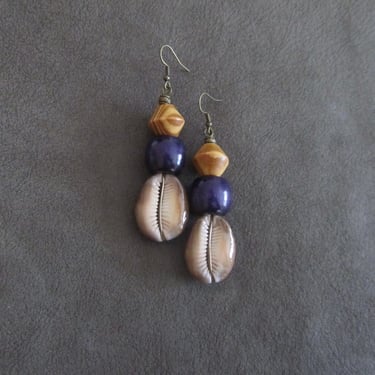 Cowrie shell earrings, long wooden earrings, African Afrocentric earrings, seashell earrings, exotic ethnic earrings, purple earrings 