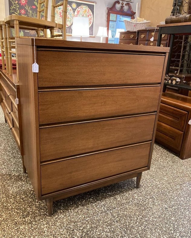 Laminate top mid century chest of drawers.  34.25” x 18” x 42”