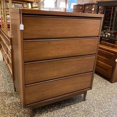 Laminate top mid century chest of drawers.  34.25” x 18” x 42”