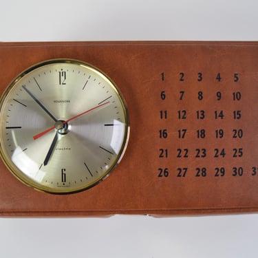 Vintage clock and calendar and box, 1970. 