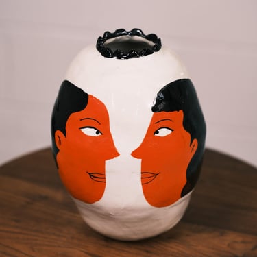 tall face vase