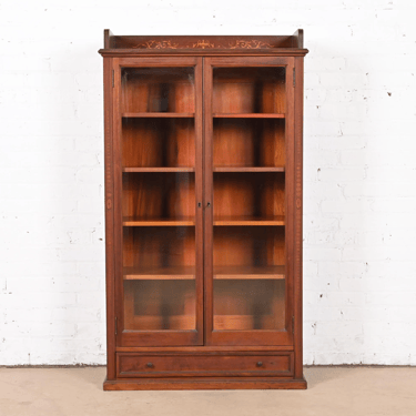 R. J. Horner Style Antique Victorian Carved Mahogany and Inlaid Marquetry Glass Front Double Bookcase, Circa 1890s