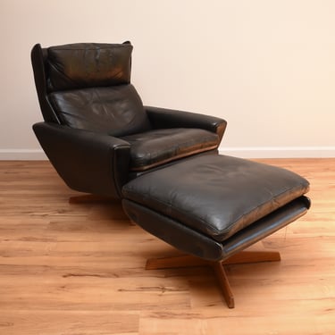 Mid Century Black Leather Arm Chair and Ottoman