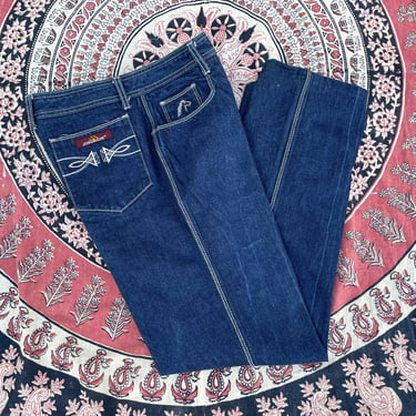 Vintage early ‘80s Jordache jeans | ‘70s disco dark wash indigo stovepipes, horse head logo, measures 30W x 29-30L 