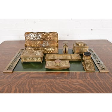 Tiffany Studios New York Pine Needle Bronze Doré and Slag Glass Nine-Piece Desk Set, Circa 1910