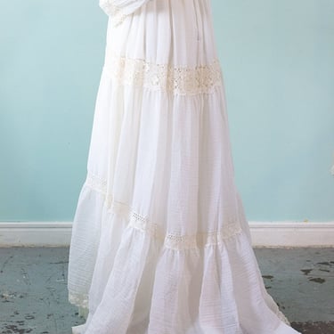 1970s wedding dress - white gauzy dress with fluted sleeves long train and ivory lace trim 