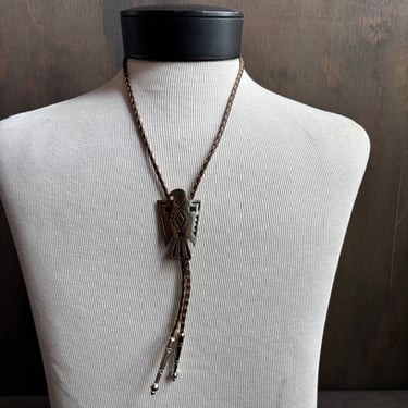 Silver Thunderbird Bolo on Two-Tone Tie