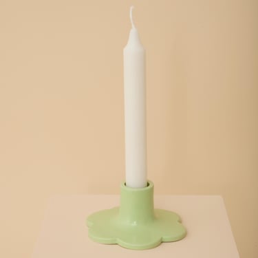 Green handmade ceramic candle holder with scalloped edge 