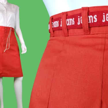 70s red twill skirt by Levi's. Big E. Comes with the original JEANS belt. Hand pockets mid length. (28 waist) 