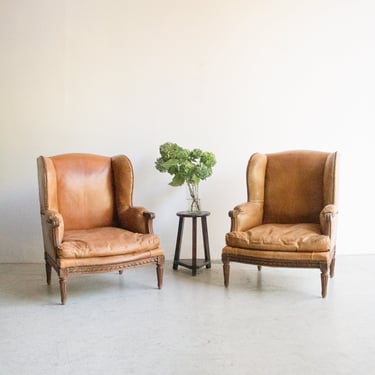 Pair of Saddle Leather Wing Chairs