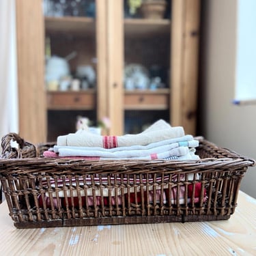 Beautiful dark wicker vintage French basket with one handle 