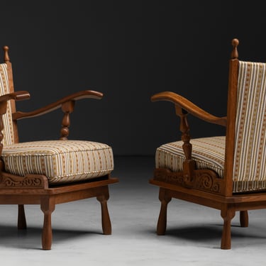 Carved Armchairs in Christopher Farr Fabric