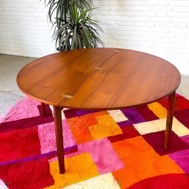 Teak flip-top coffee table by Poul Volther for Frem Rojle. Made in Denmark circa 1960s