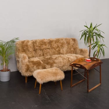 Peter Hvidt & Orla Mølgaard-Nielsen, Fritz Hansen three-seater sofa in long sheepskin 