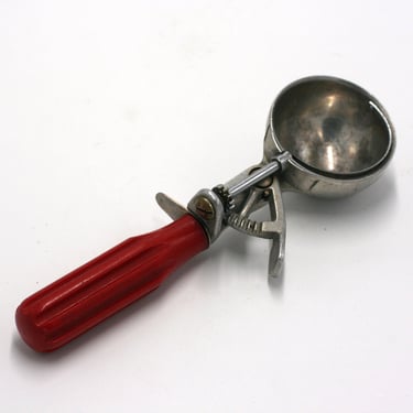 vintage peerless ice cream scoop with red handle 