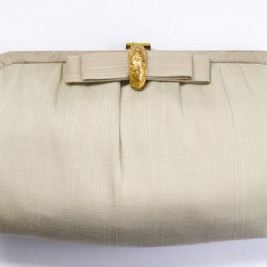 1950s tan convertible clutch with bow 