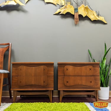 Pair of Mid-Century Modern walnut nightstands from the Monterey collection by Bassett